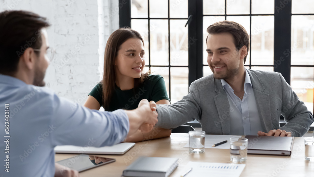 European businessmen handshake greets each other start or ends formal successful negotiations in office, client express gratitude to company representative feels satisfied make profitable deal concept European businessmen handshake greets each other start or ends formal successful negotiations in office, client express gratitude to company representative feels satisfied make profitable deal concept