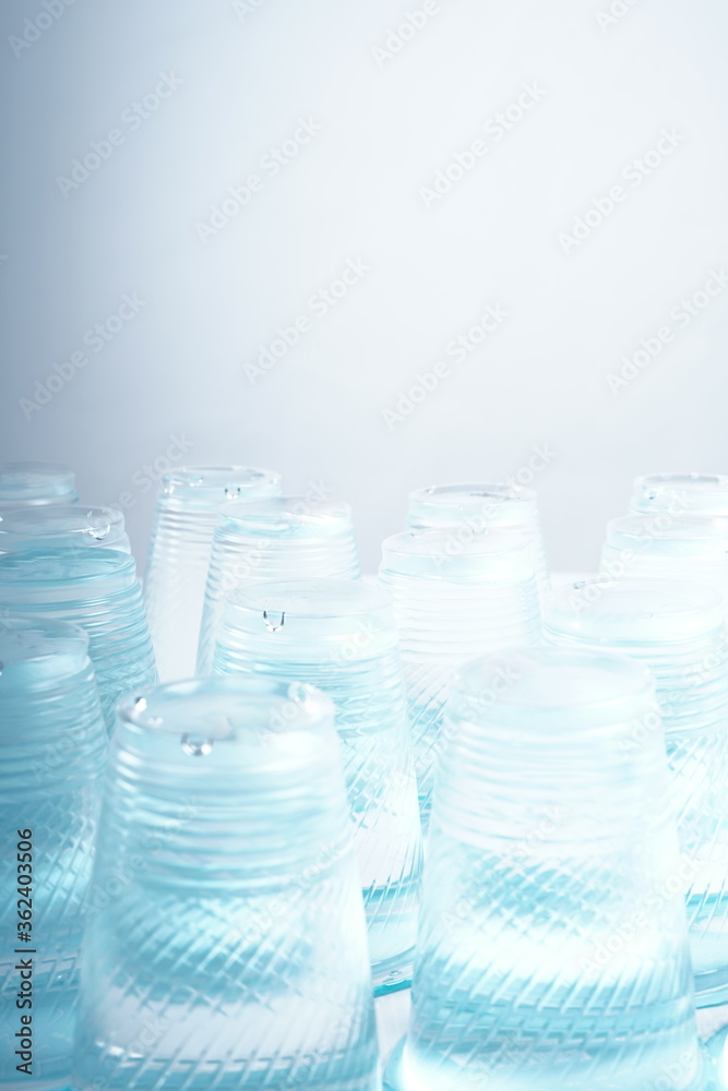 Bunch of plastic glass Mineral water isolated on white background Bunch of plastic glass Mineral water isolated on white background