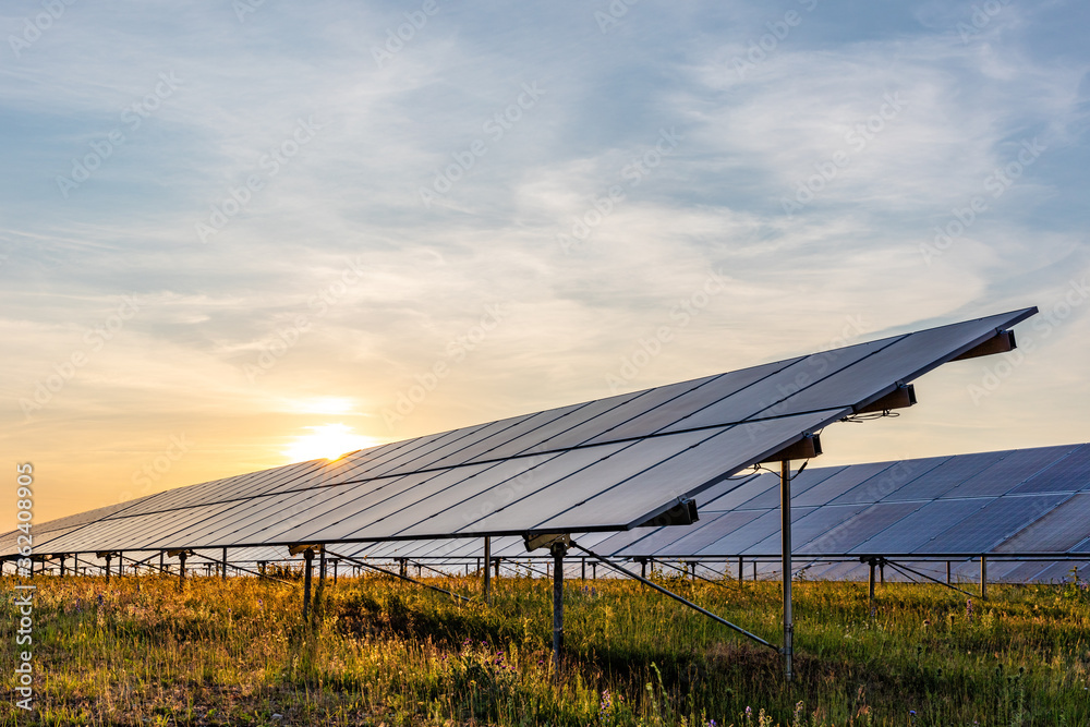 ground mounted photovoltaic power station at sunset ground mounted photovoltaic power station at sunset
