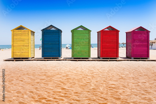 Casitas de madera de colores en la playa de la Patacona, Valencia (España) photo