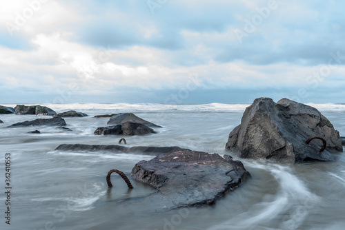 Rocks and boulders in the sea at Hoek van Holland The Netherlands. Picture with slow shutterspeed.