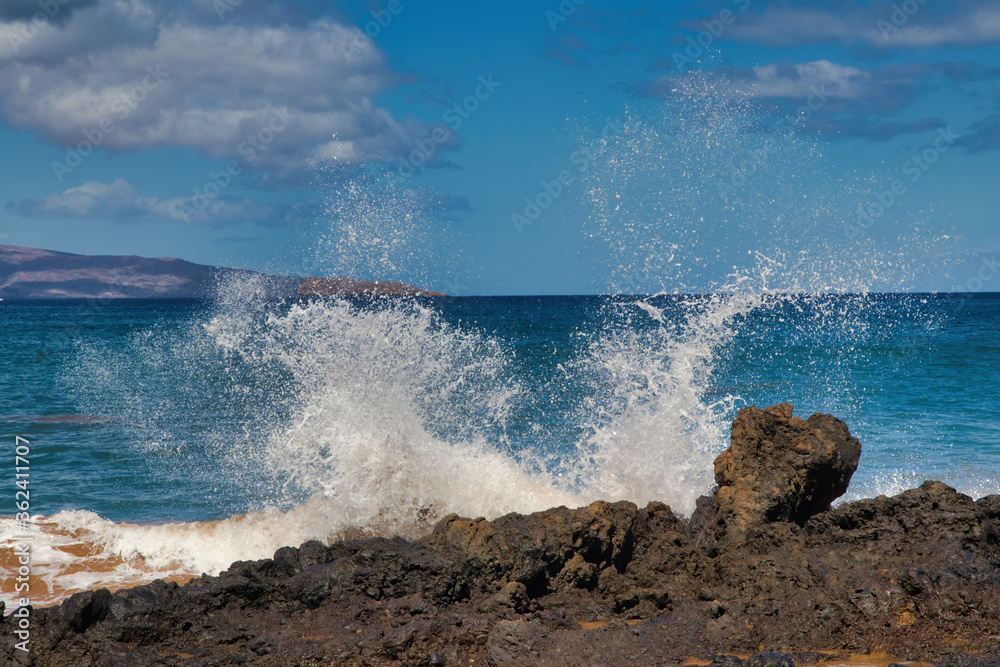 Crashing wave at secret beach on Maui.