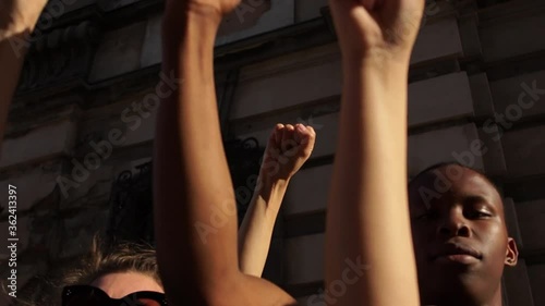 Hands of Diverse Interracial People Holding Up on Background city wall. Black Male and Female Hands . Black Lives Matter. Antiracism. Equality.