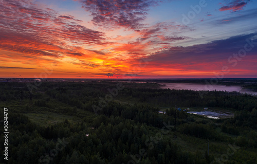 panorama of dawn in the Northern region of Russia  Khanty-Mansiysk  white nights with stunning orange dawn and clouds