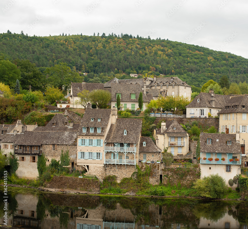 view of a river and houses in France