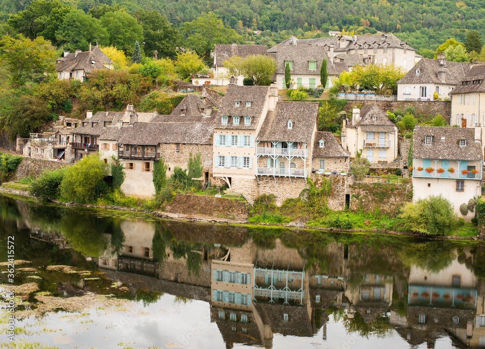 view of a river and houses in France