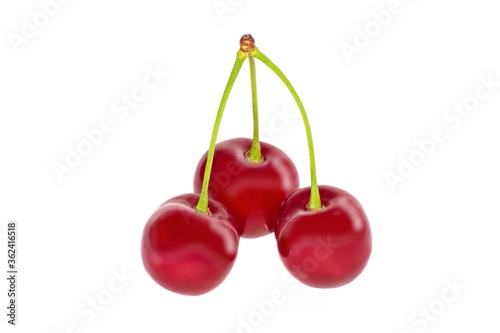 Three cherries on an isolated white background