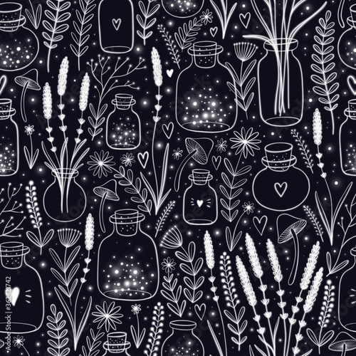 Seamless pattern with magical bottles and lavender flowers on black background with stars