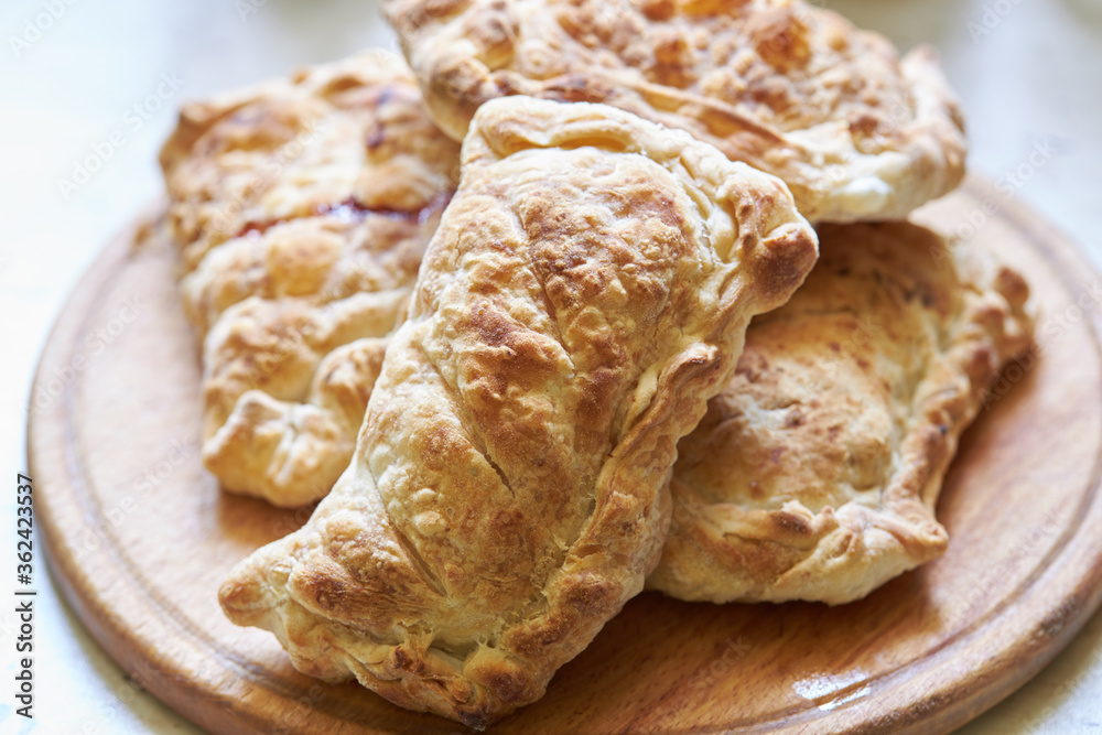 homemade stuffed apple pie or fruit pie on the table at domestic kitchen. healthy breakfast. homemade stuffed apple pie or fruit pie on the table at domestic kitchen. healthy breakfast.
