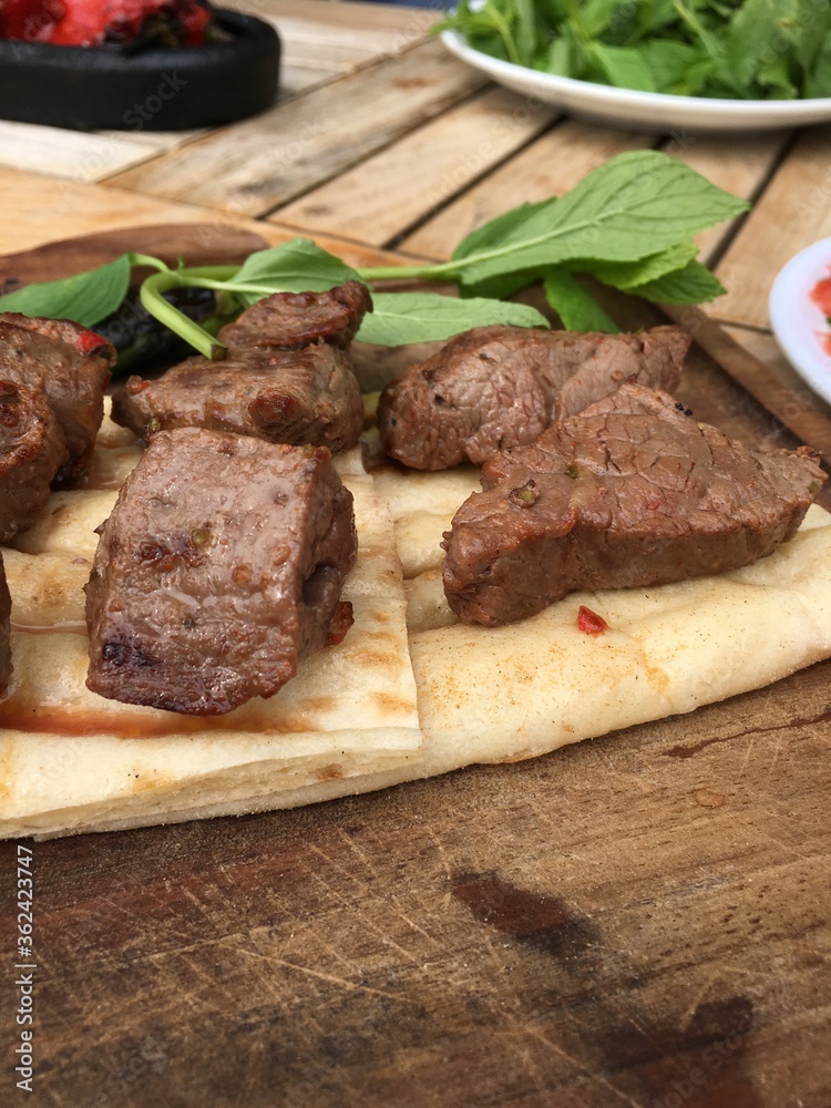Lamb kebap Turkish food with red pepper and bread