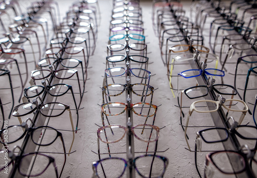Canvas Print Eyeglasses shop. Stand with glasses in the store of optics.