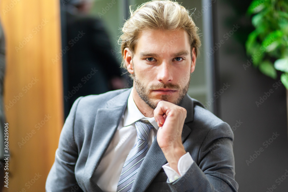 Young businessman in his office Young businessman in his office