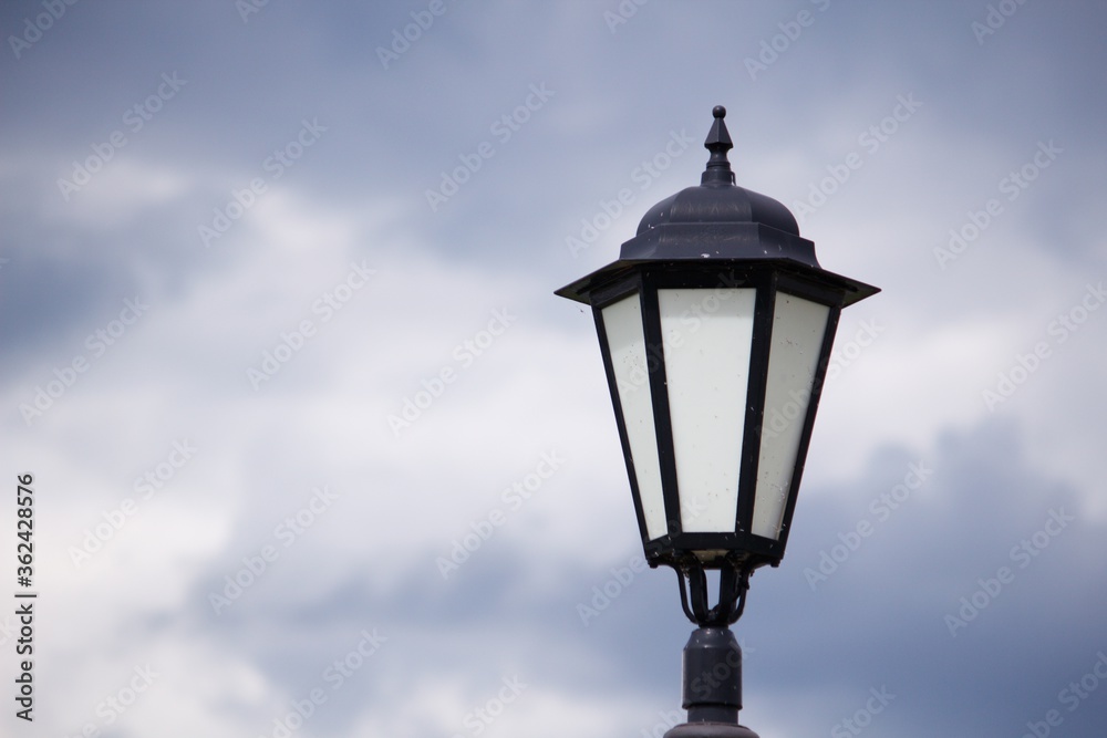 Street lamp against a cloudy sky