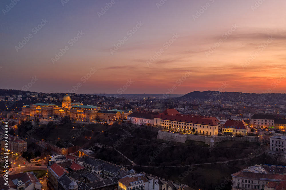 Aerial drone shot of Buda castle on Buda Hill during Budapest sunset