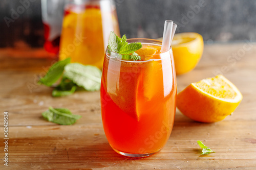 Freshmade cocktail with oranges and mint