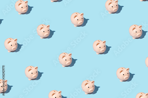 Wallpaper Mural piggy bank izometric pattern on bright light blue background. Minimal flat lay texture. Abstract trendy fresh concept. Torontodigital.ca