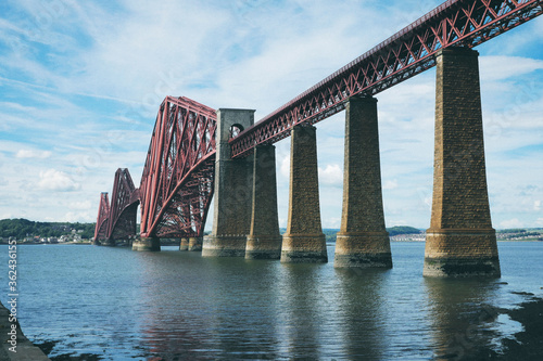 Fototapeta Naklejka Na Ścianę i Meble -  Beautiful big red bridge, village of Luss Scotland.