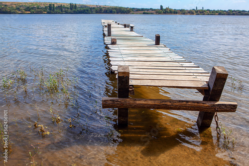 Wooden river pier for small boats 