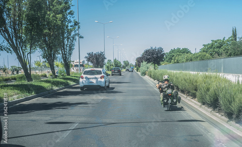 Driving slowly behind recumbent bicycle