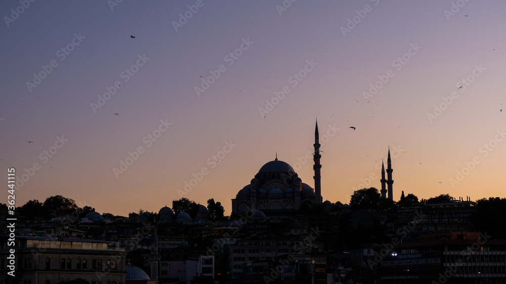 silhouette of mosque at sunset