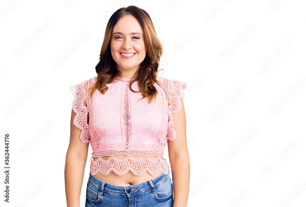 Young beautiful caucasian woman wearing casual clothes with a happy and cool smile on face. lucky person. Young beautiful caucasian woman wearing casual clothes with a happy and cool smile on face. lucky person.