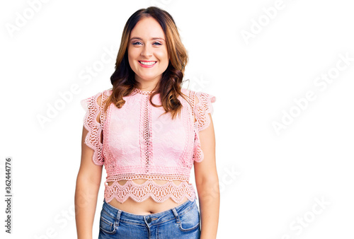 Young beautiful caucasian woman wearing casual clothes with a happy and cool smile on face. lucky person.