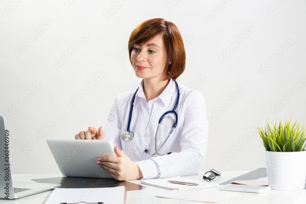 Beautiful doctor using tablet computer Beautiful doctor using tablet computer
