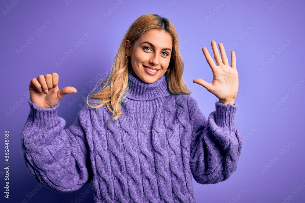 Young beautiful blonde woman wearing casual turtleneck sweater over purple background showing and pointing up with fingers number six while smiling confident and happy. Young beautiful blonde woman wearing casual turtleneck sweater over purple background showing and pointing up with fingers number six while smiling confident and happy.