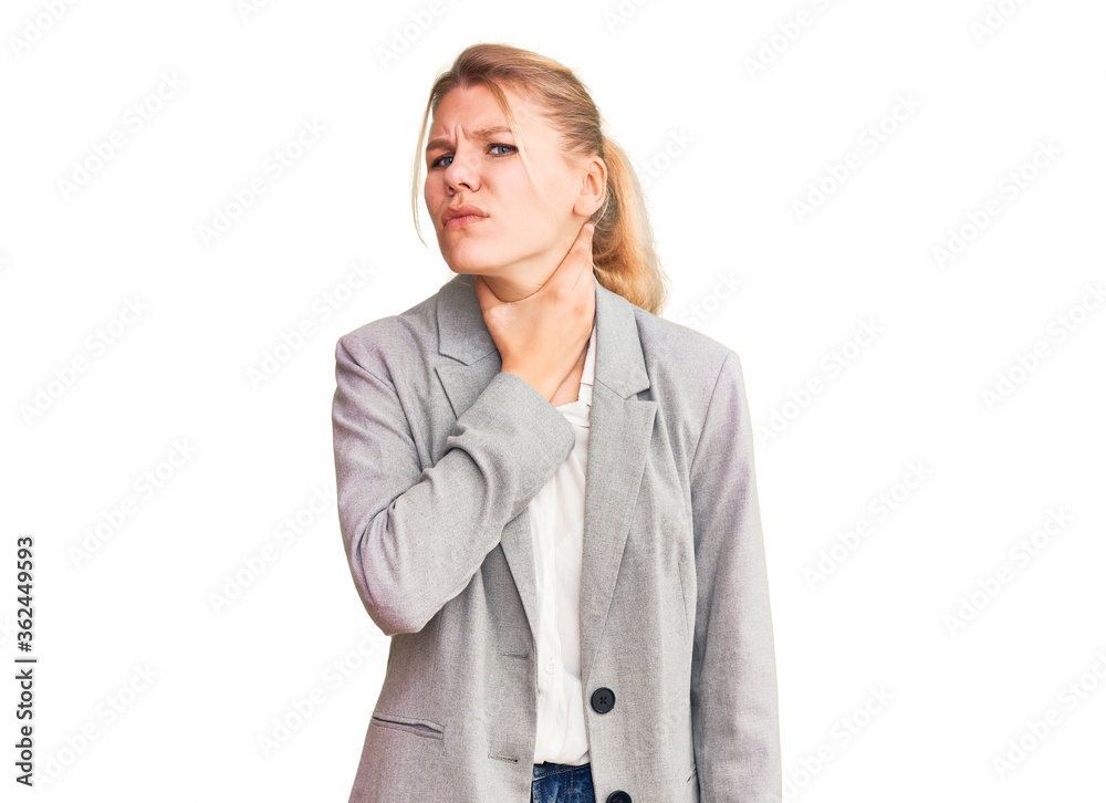 Young beautiful blonde woman wearing elegant jacket touching painful neck, sore throat for flu, clod and infection Young beautiful blonde woman wearing elegant jacket touching painful neck, sore throat for flu, clod and infection