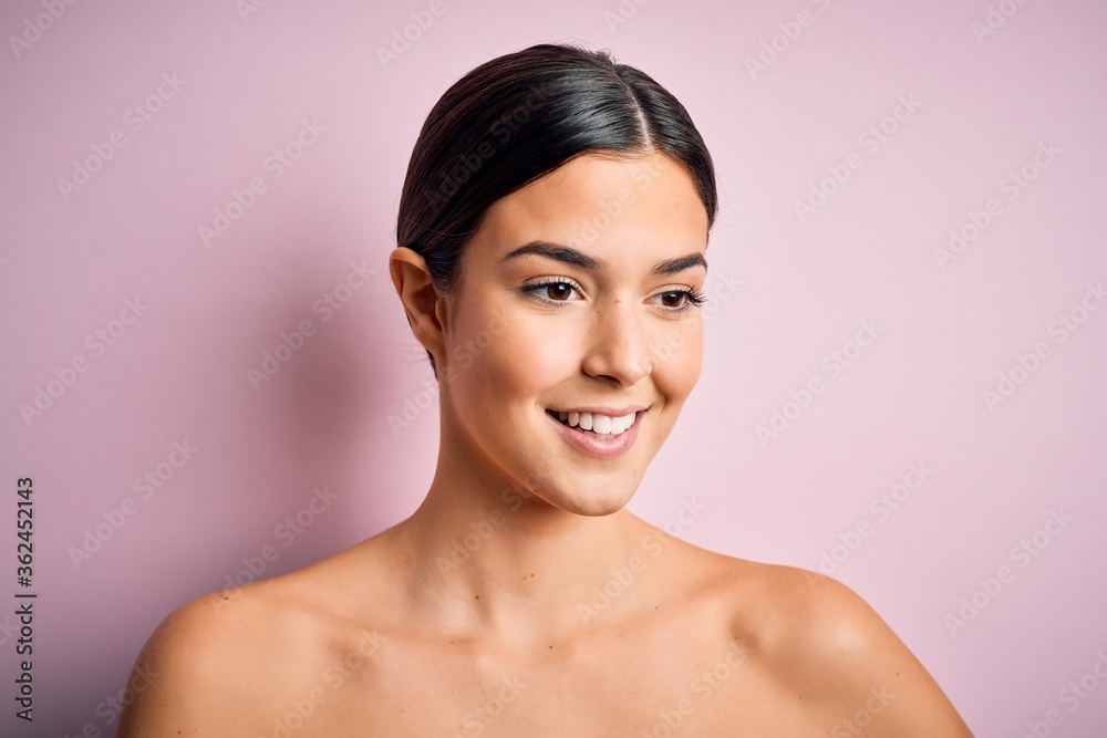Close up of young beautiful woman with clear and pure skin. Perfect and clean skincare wearing natural makeup. Smiling happy looking fresh and healthy. Close up of young beautiful woman with clear and pure skin. Perfect and clean skincare wearing natural makeup. Smiling happy looking fresh and healthy.