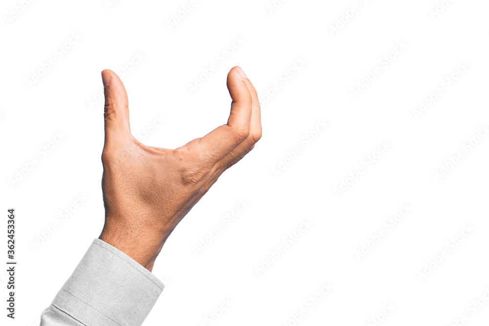 Hand of caucasian young man showing fingers over isolated white background picking and taking invisible thing, holding object with fingers showing space Hand of caucasian young man showing fingers over isolated white background picking and taking invisible thing, holding object with fingers showing space
