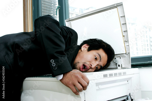 Man photostating his face