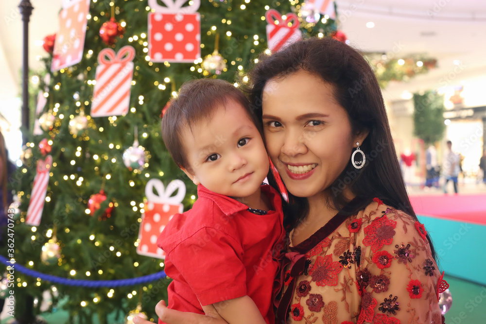 Asian boy is happy to be able to live with his mother. Asian boy is happy to be able to live with his mother.
