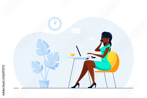 Young woman working on computer in office
