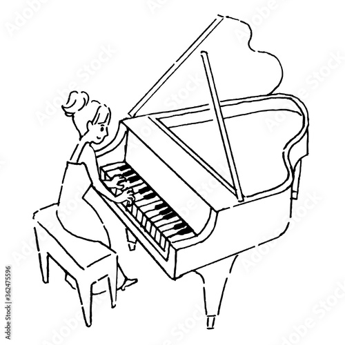 Woman playing grand piano