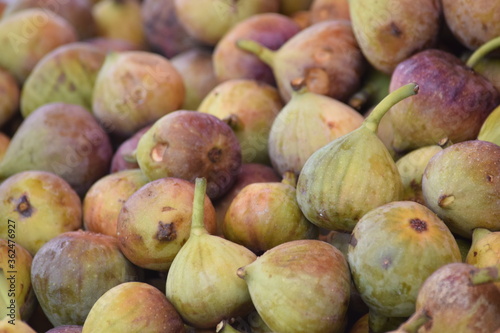 fig fruits, a sweet, soft, purple or green fruits at road side