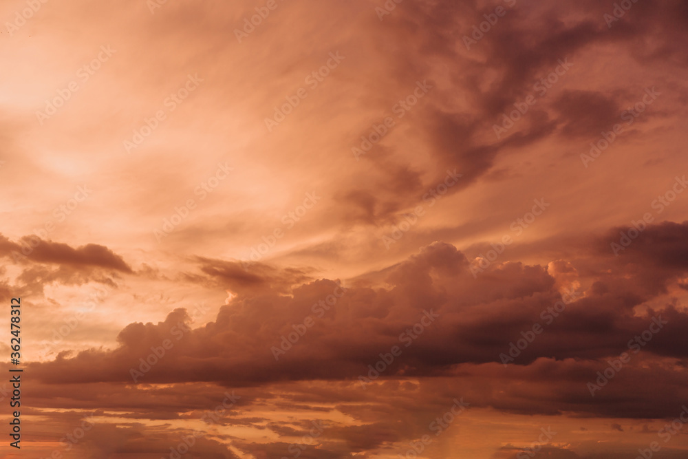 Beautiful sky with orange clouds in sky at sunset . Natural background.