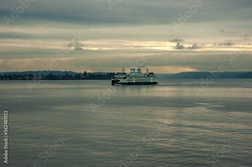 Ferry in Puget Sound near Bainbridge Island during cloudy sunset