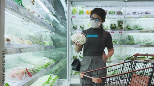 Woman supermarket shopping, smart glasses AR technology show nutrition. Future IoT big cloud data technology augmented reality 5G online internet lifestyle
