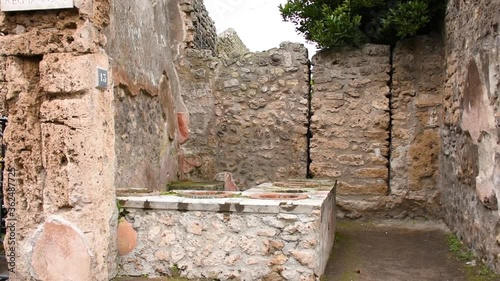 Ruins of famous Pompeii city, Italy.Thermopolium photo