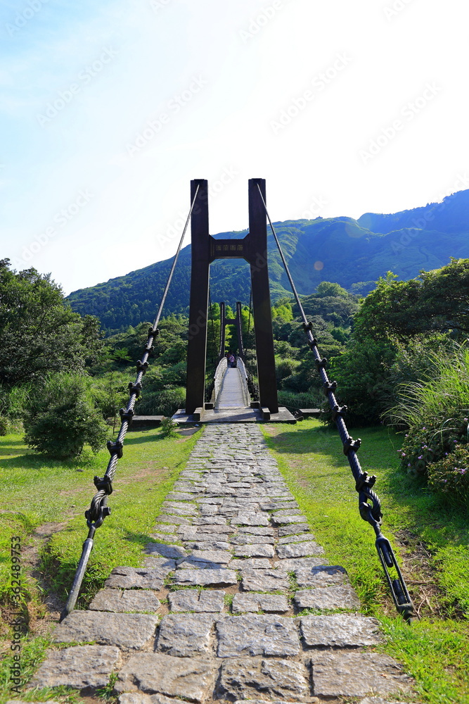 Jingshan Suspension Bridge near Qingtiangang Grassland, Yangmingshan, Taiwan Jingshan Suspension Bridge near Qingtiangang Grassland, Yangmingshan, Taiwan