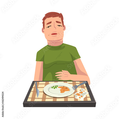 Man with Full Stomach Eating Delicious Meal, Cheerful Guy Sitting at Table with Checkered Tablecloth with Empty Plate Cartoon Vector Illustration