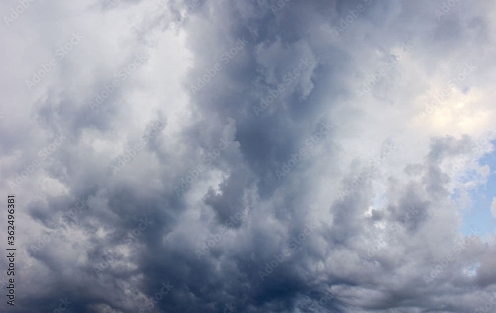 Fototapeta premium Part of the sky with cumulus and storm clouds