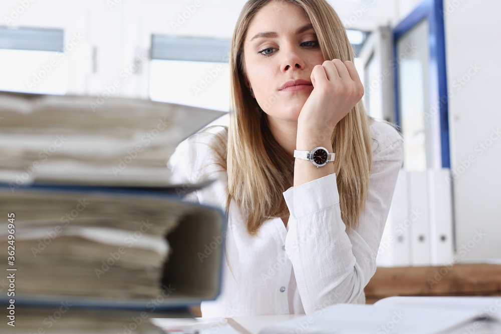 Lot of work wait for tired and exhausted woman. Huge pile of document folders, headache and depression, irs, new problems, emotion expression, vacancy or holiday dream concept Lot of work wait for tired and exhausted woman. Huge pile of document folders, headache and depression, irs, new problems, emotion expression, vacancy or holiday dream concept