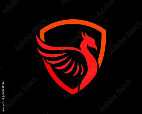 Simple abstract phoenix inside the shield