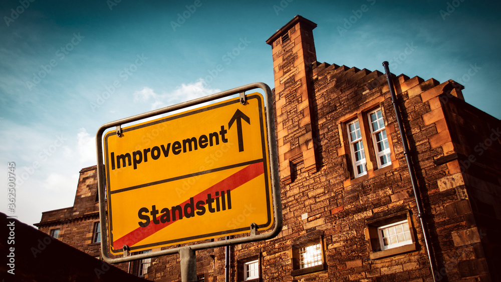 Fototapeta premium Street Sign to Improvement versus Standstill