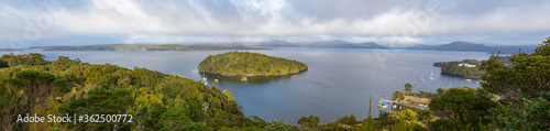 Panorama: Looking over to Iona Island, Paterson Inlet (Whaka A Te Wera), Halfmoon Bay, from Observation Rock on Stewart Island, New Zealand photo