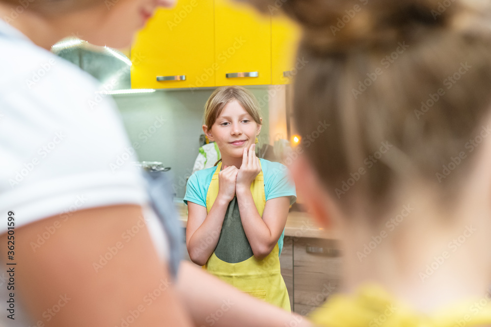 portrait of beautiful girl in the kitchen portrait of beautiful girl in the kitchen