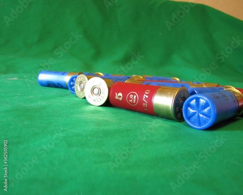 shotgun cartridges 12 gauge on a monotonous background