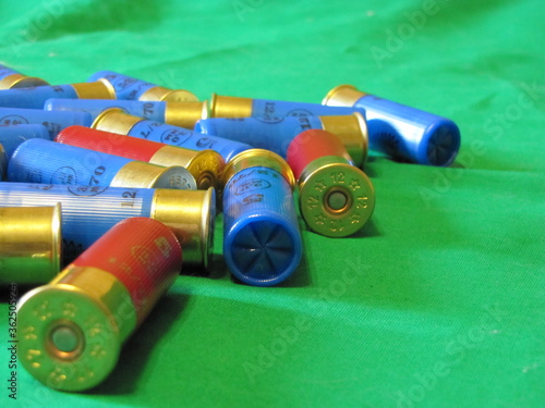 shotgun cartridges 12 gauge on a monotonous background